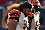 EAST RUTHERFORD, NJ - SEPTEMBER 21:  Domata Peko #94 of the Cincinnati Bengals walks off the field after the loss against the New York Giants on September 21, 2008 at Giants Stadium in East Rutherford, New Jersey. The Giants defeated the Bengals 26-23 in overtime.  (Photo by Elsa/Getty Images)
