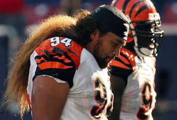 EAST RUTHERFORD, NJ - SEPTEMBER 21:  Domata Peko #94 of the Cincinnati Bengals walks off the field after the loss against the New York Giants on September 21, 2008 at Giants Stadium in East Rutherford, New Jersey. The Giants defeated the Bengals 26-23 in overtime.  (Photo by Elsa/Getty Images)