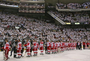 DETROIT - JUNE 4:  Members of the Detroit Red Wings and the Pittsburgh Penguins shake hands following game six of the 2008 NHL Stanley Cup Finals at Mellon Arena on June 4, 2008 in Pittsburgh. Pennsylvania. (Photo by Bruce Bennett/Getty Images)
