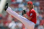 CINCINNATI - APRIL 09:  Bronson Arroyo #61 of the Cincinnati Reds throws a pitch during the game against the New York Mets at Great American Ball Park on April 9, 2009 in Cincinnati, Ohio.  (Photo by Andy Lyons/Getty Images)