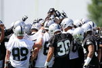 ALAMEDA, CA - MAY 08:  The Oakland Raiders huddle together during the Raiders minicamp at the team's permanent training facility on May 8, 2009 in Alameda, California.  (Photo by Ezra Shaw/Getty Images)