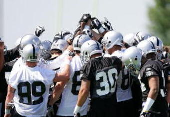 ALAMEDA, CA - MAY 08:  The Oakland Raiders huddle together during the Raiders minicamp at the team's permanent training facility on May 8, 2009 in Alameda, California.  (Photo by Ezra Shaw/Getty Images)