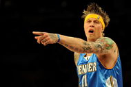 LOS ANGELES, CA - MAY 27: Chris Andersen #11 of the Denver Nuggets points in the first half against the Los Angeles Lakers in Game Five of the Western Conference Finals during the 2009 NBA Playoffs at Staples Center on May 27, 2009 in Los Angeles, California. NOTE TO USER: User expressly acknowledges and agrees that, by downloading and or using this photograph, User is consenting to the terms and conditions of the Getty Images License Agreement. (Photo by Harry How/Getty Images)