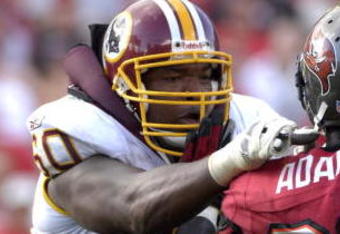 TAMPA, FL - NOVEMBER 25: Tackle Chris Samuels #60 of the Washington Redskins blocks against the Tampa Bay Buccaneers at the Raymond James Stadium on November 25, 2007 in Tampa, Florida.  The Bucs won 19-13. (Photo by Al Messerschmidt/Getty Images)