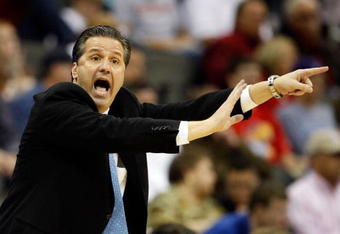KANSAS CITY, MO - MARCH 21:  Head Coach John Calipari of the Memphis Tigers yells and points a finger from the sideline during their second round game against the Maryland Terrapins in the NCAA Division I Men's Basketball Tournament at the Sprint Center on March 21, 2009 in Kansas City, Missouri. The Tigers defeated the Terrapins 89-70.  (Photo by Jamie Squire/Getty Images)