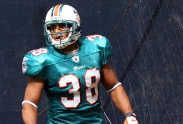 HOUSTON - OCTOBER 12:  Running back Patrick Cobbs #38 of the Miami Dolphins celebrates a touchdown against the Houston Texans in the first quarter at Reliant Stadium on October 12, 2008 in Houston, Texas.  (Photo by Ronald Martinez/Getty Images)