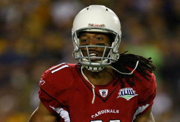TAMPA, FL - FEBRUARY 01:  Larry Fitzgerald #11 of the Arizona Cardinals catches the ball against the Pittsburgh Steelers during Super Bowl XLIII on February 1, 2009 at Raymond James Stadium in Tampa, Florida.  (Photo by Jamie Squire/Getty Images)