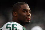 EAST RUTHERFORD, NJ - NOVEMBER 09: Vernon Gholston #56 of the New York Jets on the sideline against the St. Louis Rams at Giants Stadium on November 9, 2008 in East Rutherford, New Jersey. (Photo by Nick Laham/Getty Images) 