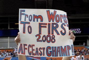 MIAMI, FL - JANUARY 4:  A fan of the Miami Dolphins celebrates a playoff season against the Baltimore Ravens in an NFL Wildcard Playoff Game at Dolphins Stadium on January 4, 2009 in Miami, Floirda.  (Photo by Al Messerschmidt/Getty Images)