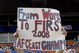 MIAMI, FL - JANUARY 4:  A fan of the Miami Dolphins celebrates a playoff season against the Baltimore Ravens in an NFL Wildcard Playoff Game at Dolphins Stadium on January 4, 2009 in Miami, Floirda.  (Photo by Al Messerschmidt/Getty Images)