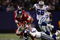 EAST RUTHERFORD, NJ - DECEMBER 03:  Jeremy Shockey #80 of the New York Giants is tackled by Roy Williams #31 of the Dallas Cowboys at Giants Stadium on December 3, 2006 in East Rutherford, New Jersey.  (Photo by Chris McGrath/Getty Images)
