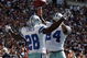 IRVING, TX - OCTOBER 05:  Running back Felix Jones #28 of the Dallas Cowboys celebrates a touchdown with Marion Barber #24 against the Cincinnati Bengals at Texas Stadium on October 5, 2008 in Irving, Texas.  (Photo by Ronald Martinez/Getty Images)