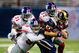 ST. LOUIS, MO - SEPTEMBER 14: Dane Looker #89 of the St. Louis Rams is tackled by Antonio Pierce #58, James Butler #37 and Aaron Boss #31 all of the New York Giants at the Edward Jones Dome on September 14, 2008 in St. Louis, Missouri. The Giants beat the Rams 41-13. (Photo by Dilip Vishwanat/Getty Images)