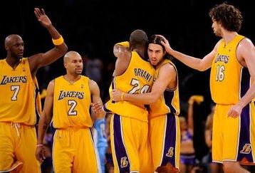 LOS ANGELES, CA - MAY 27:  (2nd R) Sasha Vujacic #18 of the Los Angeles Lakers is hugged by teammate Kobe Bryant #24 and greeted by teammates Lamar Odom #7, Derek Fisher #2 and Pau Gasol #16 of the Lakers in the second quarter against the Denver Nuggets in Game Five of the Western Conference Finals during the 2009 NBA Playoffs at Staples Center on May 27, 2009 in Los Angeles, California. NOTE TO USER: User expressly acknowledges and agrees that, by downloading and or using this photograph, User is consenting to the terms and conditions of the Getty Images License Agreement.  (Photo by Kevork Djansezian/Getty Images)
