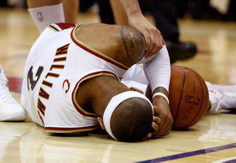 CLEVELAND - MAY 22: Mo Williams #2 of the Cleveland Cavaliers lays on the floor after a play against the Orlando Magic in Game Two of the Eastern Conference Finals during the 2009 Playoffs at Quicken Loans Arena on May 22, 2009 in Cleveland, Ohio. NOTE TO USER: User expressly acknowledges and agrees that, by downloading and or using this photograph, User is consenting to the terms and conditions of the Getty Images License Agreement  (Photo by Gregory Shamus/Getty Images)