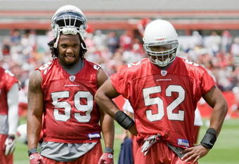 TEMPE, AZ - MAY 2 :  Will Davis #59 and Cody Brown #52 of the Arizona Cardinals watch a drill during a team minicamp at the team training facility on May 2, 2009 in Tempe, Arizona.  (Photo by Jonathan Willey/Getty Images)