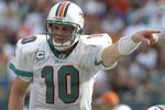 MIAMI, FL - JANUARY 4:  Quarterback Chad Pennington #10 of the Miami Dolphins directs play against the Baltimore Ravens in an NFL Wildcard Playoff Game at Dolphins Stadium on January 4, 2009 in Miami, Florida.  (Photo by Al Messerschmidt/Getty Images) 