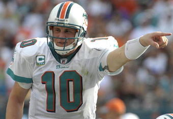 MIAMI, FL - JANUARY 4:  Quarterback Chad Pennington #10 of the Miami Dolphins directs play against the Baltimore Ravens in an NFL Wildcard Playoff Game at Dolphins Stadium on January 4, 2009 in Miami, Florida.  (Photo by Al Messerschmidt/Getty Images) 