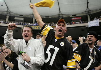 INDIANAPOLIS - JANUARY 15:  Fans of the Pittsburgh Steelers celebrate the Steelers 21-18 win over the Inidanapolis Colts during the AFC Divisional Playoffs January 15, 2006 at the RCA Dome in Indianapolis, Indiana.  (Photo by Andy Lyons/Getty Images)