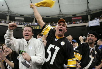 INDIANAPOLIS - JANUARY 15:  Fans of the Pittsburgh Steelers celebrate the Steelers 21-18 win over the Inidanapolis Colts during the AFC Divisional Playoffs January 15, 2006 at the RCA Dome in Indianapolis, Indiana.  (Photo by Andy Lyons/Getty Images)