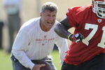 KANSAS CITY, MO - MAY 9:  Alex Magee #71 of the Kansas City Chiefs goes through a drill as defensive line coach TIm Krumrie looks on during a rookie minicamp at the Chiefs practice facility on May 9, 2009 in Kansas City, Missouri. (Photo by G. Newman Lowrance/Getty Images)