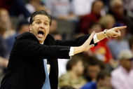 KANSAS CITY, MO - MARCH 21: Head Coach John Calipari of the Memphis Tigers yells and points a finger from the sideline during their second round game against the Maryland Terrapins in the NCAA Division I Men's Basketball Tournament at the Sprint Center on March 21, 2009 in Kansas City, Missouri. The Tigers defeated the Terrapins 89-70. (Photo by Jamie Squire/Getty Images)