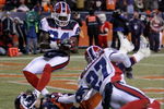 DENVER - DECEMBER 21:  Wide receiver Brandon Stokley #14 of the Denver Broncos was unable to make a reception on the Broncos final offensive play of the game as Reggie Corner #27 of the Buffalo Bills provided coverage on the play and Terrence McGee #24 collects the loose ball during NFL action at Invesco Field at Mile High on December 21, 2008 in Denver, Colorado. The Bills defeated the Broncos 30-23.  (Photo by Doug Pensinger/Getty Images)