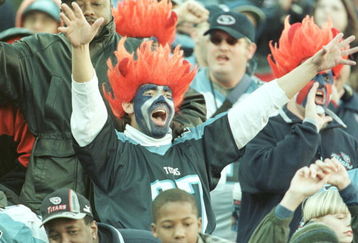 26 Dec 1999:  Fans let loose at the game between the Jacksonville Jaguars and the Tennessee Titans at Adelphia Coliseum in Nashville, Tennessee. The Titans won 41-14. Mandatory Credit: Andy Lyons/ALLSPORT