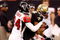 NEW ORLEANS - DECEMBER 07:  Devery Henderson #19 of the New Orleans Saints is tackled by Domonique Foxworth #24 and Keith Brooking #56 of the Atlanta Falcons on December 7, 2008 at the Superdome in New Orleans, Louisiana.  (Photo by Chris Graythen/Getty Images)