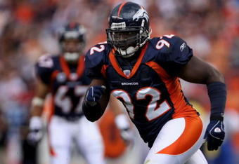 DENVER - SEPTEMBER 16:  Defensive end Elvis Dumervil #92 of the Denver Broncos leaves the line of scrimmage as the Denver Broncos defeated the Oakland Raiders 23-20 in overtime during week two NFL action at Invesco Field at Mile High on September 16, 2007 in Denver, Colorado.  (Photo by Doug Pensinger/Getty Images)