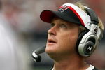HOUSTON - DECEMBER 9:  Head Coach Jon Gruden of the Tampa Bay Buccaneers looks to the scoreboard during the NFL game against of the Houston Texans  at  Reliant Stadium on December 9, 2007 in Houston, Texas. (Photo by Thomas B.  Shea/Getty Images) 