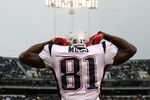 OAKLAND, CA - DECEMBER 14: Randy Moss #81 of the New England Patriots celeberates after scoring a touchdown against the Oakland Raiders during an NFL game on December 14, 2008 at the Oakland-Alameda County Coliseum in Oakland, California.  (Photo by Jed Jacobsohn/Getty Images)
