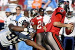TAMPA, FL - DECEMBER 21:  Linebacker Shaun Phillips #95 of the San Diego Chargers stretches for quarterback Jeff Garcia #7 of the Tampa Bay Buccaneers at Raymond James Stadium on December 21, 2008 in Tampa, Florida.  (Photo by Al Messerschmidt/Getty Images)