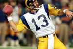 7 Nov 1999:  Quarterback Kurt Warner #13 of the St. Louis Rams looks to pass against the Detriot Lions at the Pontiac Silverdome in Pontiac, Michigan. The Lions defeated the Rams 31-27. Mandatory Credit: Tom Pidgeon/Allsport