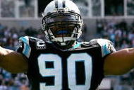 CHARLOTTE, NC - OCTOBER 28:  Julius Peppers #90 of the Carolina Panthers celebrates after a defensive stop against the Indianapolis Colts during their game at Bank of America Stadium on October 28, 2007 in Charlotte, North Carolina.  (Photo by Streeter Lecka/Getty Images)