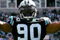 CHARLOTTE, NC - OCTOBER 28:  Julius Peppers #90 of the Carolina Panthers celebrates after a defensive stop against the Indianapolis Colts during their game at Bank of America Stadium on October 28, 2007 in Charlotte, North Carolina.  (Photo by Streeter Lecka/Getty Images)