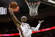 CLEVELAND - MAY 28: LeBron James #23 of the Cleveland Cavaliers pulls down a rebound against the Orlando Magic in Game Five of the Eastern Conference Finals during the 2009 Playoffs at Quicken Loans Arena on May 28, 2009 in Cleveland, Ohio. NOTE TO USER: User expressly acknowledges and agrees that, by downloading and or using this photograph, User is consenting to the terms and conditions of the Getty Images License Agreement  (Photo by Elsa/Getty Images)