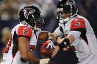MINNEAPOLIS - DECEMBER 21: Michael Turner #33 of the Atlanta Falcons receives a handoff from quarterback Matt Ryan #2 during an NFL game against the Minnesota Vikings at the Hubert H. Humphrey Metrodome, on December 21, 2008 in Minneapolis, Minnesota. (Photo by Tom Dahlin/Getty Images)