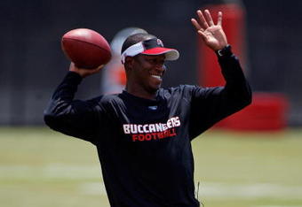 TAMPA - MAY 01:  Head coach Raheem Morris of the Tampa Bay Buccaneers warms up during the Buccaneers Rookie Minicamp at One Buccaneer Place on May 1, 2009 in Tampa, Florida.  (Photo by J. Meric/Getty Images)