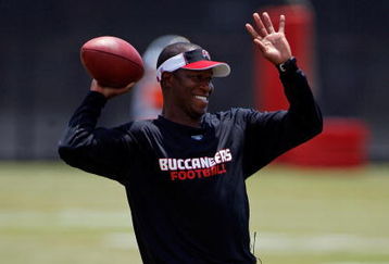 TAMPA - MAY 01:  Head coach Raheem Morris of the Tampa Bay Buccaneers warms up during the Buccaneers Rookie Minicamp at One Buccaneer Place on May 1, 2009 in Tampa, Florida.  (Photo by J. Meric/Getty Images)