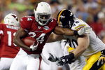 TAMPA, FL - FEBRUARY 01:  Running back Tim Hightower #34 of the Arizona Cardinals runs the ball and attempts to get by defensive end Travis Kirschke #90 of the Pittsburgh Steelers during Super Bowl XLIII on February 1, 2009 at Raymond James Stadium in Tampa, Florida.  (Photo by Streeter Lecka/Getty Images)