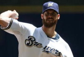 MILWAUKEE - MAY 14: Starting pitcher Dave Bush #31 of the Milwaukee Brewers delivers the ball against the Florida Marlins on May 14, 2009 at Miller Park in Milwaukee, Wisconsin. The Brewers defeated the Marlins 5-3. (Photo by Jonathan Daniel/Getty Images)