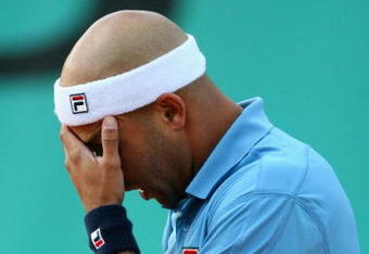 PARIS - MAY 26:  James Blake of USA reacts during the Men's First Round match against Leonardo Mayer of Argentina on day three of the French Open at Roland Garros on May 26, 2009 in Paris, France.  (Photo by Matthew Stockman/Getty Images)