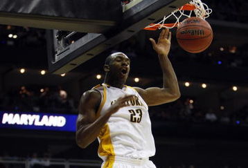 KANSAS CITY, MO - MARCH 19:  Patrick Christopher #23 of the California Golden Bears follows through on his dunk as Eric Hayes #5 of the Maryland Terrapins looks on in the first half during the first round of the NCAA Division I Men's Basketball Tournament at the Sprint Center on March 19, 2009 in Kansas City, Missouri.  (Photo by Jamie Squire/Getty Images)