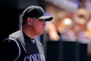 DENVER - MAY 14:  Manager Clint Hurdle #13 of the Colorado Rockies looks on from the dugout against the Houston Astros during MLB action at Coors Field on May 14, 2009 in Denver, Colorado. The Astros defeated the Rockies 5-3.  (Photo by Doug Pensinger/Getty Images)