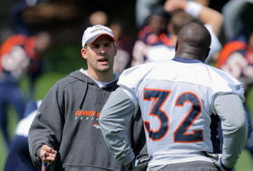 ENGLEWOOD, CO - MAY 03:  Head coach Josh McDaniels of the Denver Broncos chats with running back LaMont Jordan #32 during minicamp at the Broncos training facility on May 3, 2009 in Englewood, Colorado.  (Photo by Doug Pensinger/Getty Images)