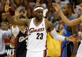 CLEVELAND - MAY 28:  LeBron James #23 of the Cleveland Cavaliers high fives with teammate Anderson Varejao #17 after a play against the Orlando Magic in Game Five of the Eastern Conference Finals during the 2009 Playoffs at Quicken Loans Arena on May 28, 2009 in Cleveland, Ohio. NOTE TO USER: User expressly acknowledges and agrees that, by downloading and or using this photograph, User is consenting to the terms and conditions of the Getty Images License Agreement  (Photo by Gregory Shamus/Getty Images)