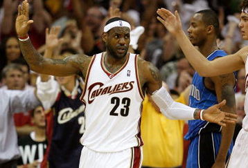CLEVELAND - MAY 28:  LeBron James #23 of the Cleveland Cavaliers high fives with teammate Anderson Varejao #17 after a play against the Orlando Magic in Game Five of the Eastern Conference Finals during the 2009 Playoffs at Quicken Loans Arena on May 28, 2009 in Cleveland, Ohio. NOTE TO USER: User expressly acknowledges and agrees that, by downloading and or using this photograph, User is consenting to the terms and conditions of the Getty Images License Agreement  (Photo by Gregory Shamus/Getty Images)