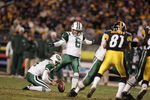 PITTSBURGH - DECEMBER 12:  Kicker Doug Brien #6 of the New York Jets attempts to score off a hold by punter Toby Gowin #4 during the game against the Pittsburgh Steelers on December 12, 2004 at Heinz Field in Pittsburgh, Pennsylvania. The Steelers won 17-7. (Photo by Al Bello/Getty Images)