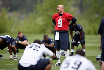 RENTON, WA - MAY 2:  Matt Hasselbeck #8 of the Seattle Seahawks laughs while stretching during minicamp at the Seahawks training facility on May 2, 2009 in Renton, Washington. (Photo by Otto Greule Jr/Getty Images) 